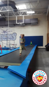 Zax running on the trampoline at a food allergy inclusive birthday party by Allergy Superheroes.