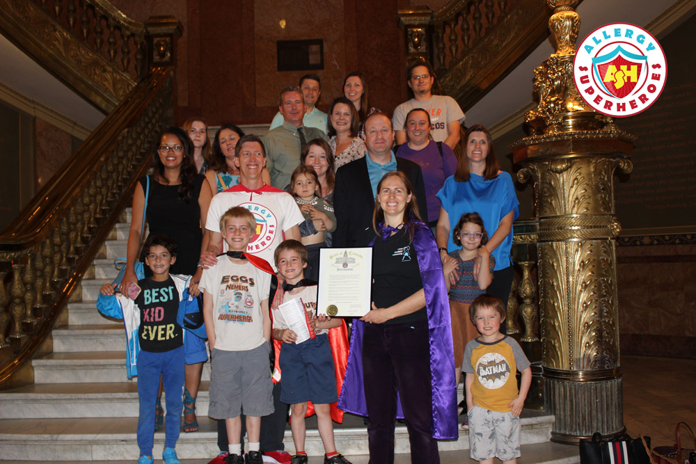 A group of 19 Coloradoans affected by Food Allergies standing with Governor Jared Polis, to celebrate the Food Allergy Week Proclamation | by Food Allergy Superheroes