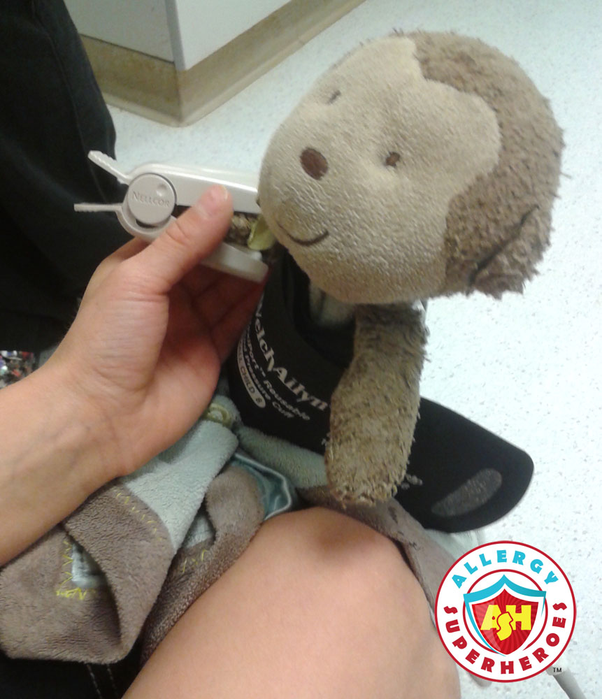 Stuffie getting its vitals taken | Food Allergy Superheroes