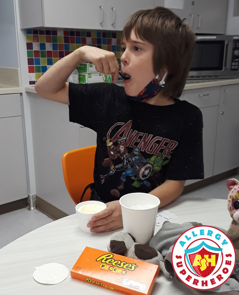 Kal eating Reese's Pieces at his final peanut challenge | Food Allergy Superheroes