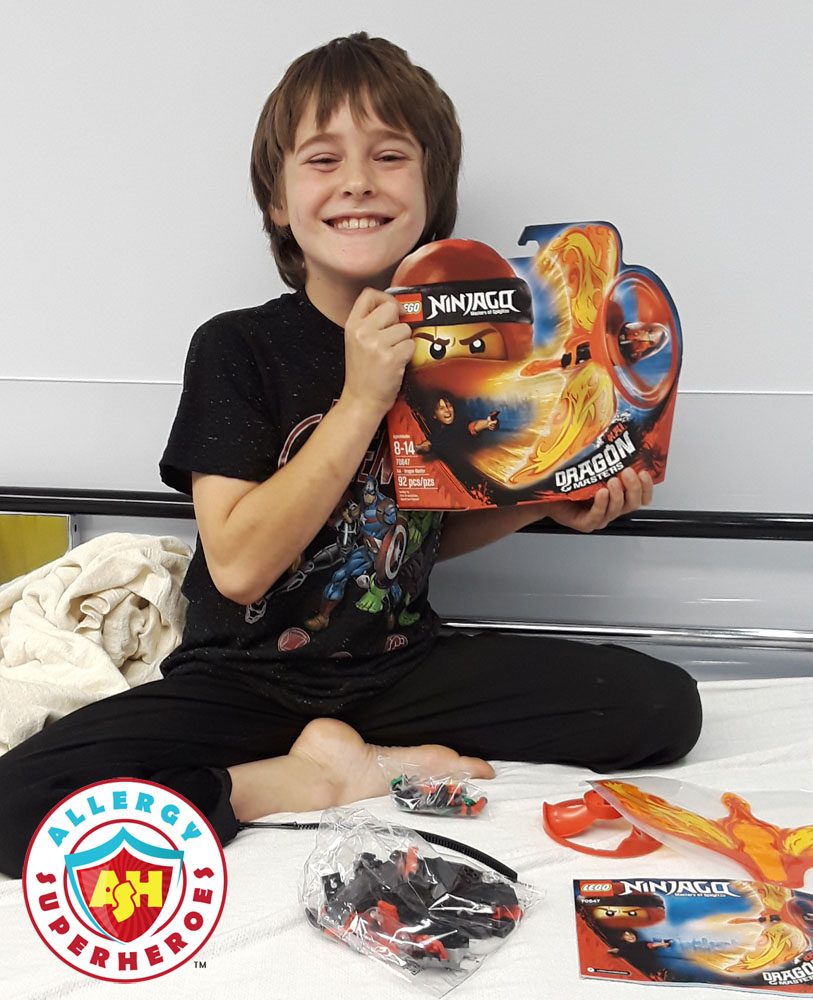 Recovering and enjoying his prize | Food Allergy Superheroes