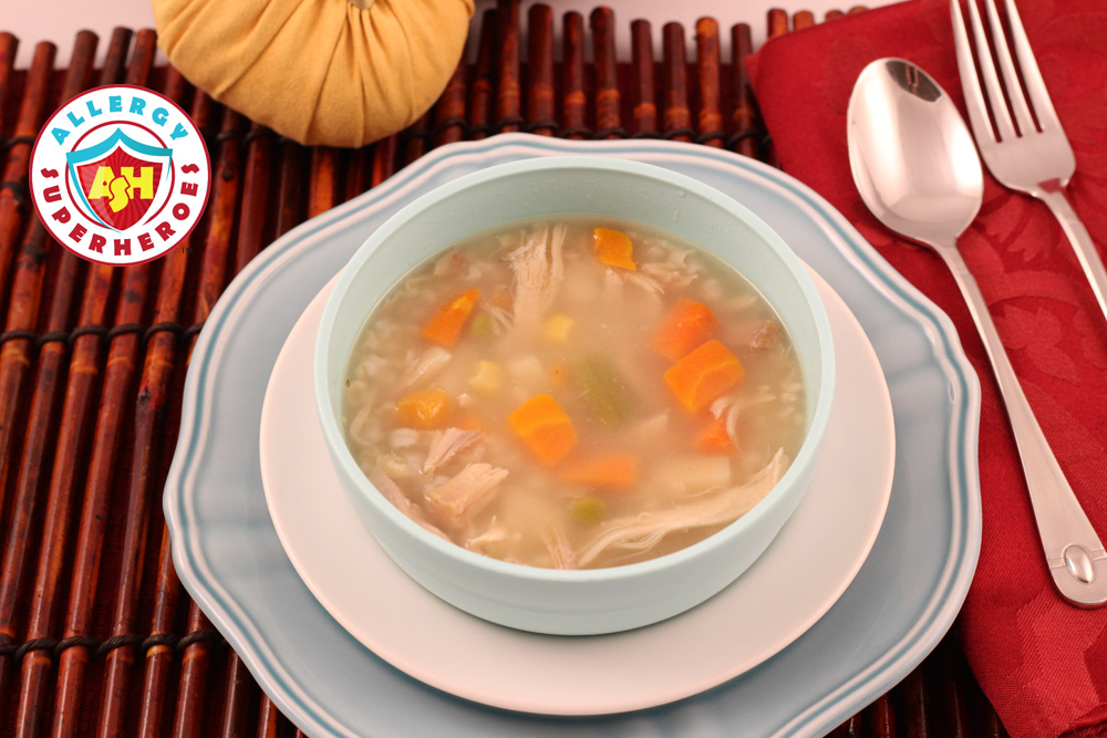 Place setting and bowl of Turkey and Rice Soup | Food Allergy Superheroes
